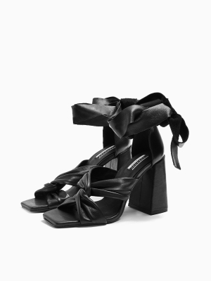 Revolve Black Leather High Sandals