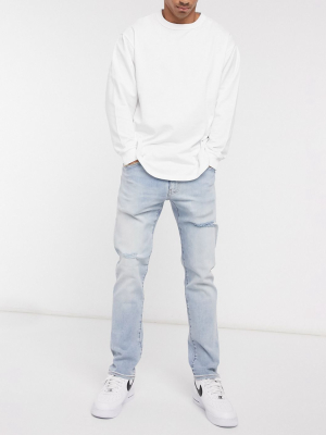 Levi's 502 Slim Tapered Fit Jeans In Future Flex