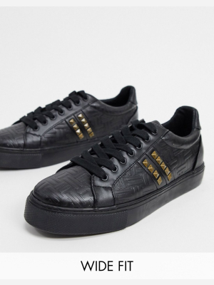 Asos Design Wide Fit Sneakers In Black Emboss With Studs