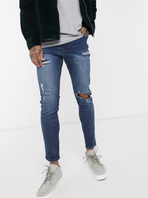 New Look Rip And Repair Skinny Jeans In Mid Wash