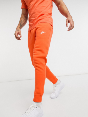 Nike Club Cuffed Sweatpants In Orange