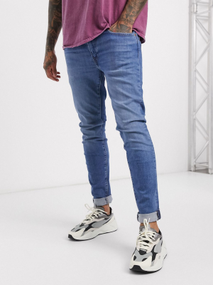 Levi's Skinny Tapered Fit Jeans In Amalfi Pier Dark Wash