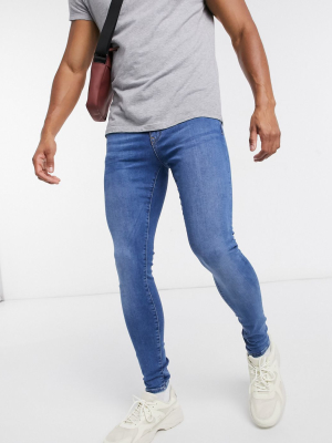 River Island Spray On Jeans In Mid Blue Wash