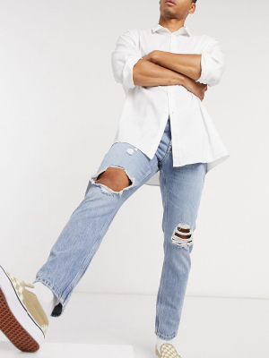 Asos Design Slim Jeans In Vintage Light Wash With Knee Rips