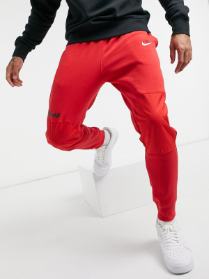 Nike Air Cuffed Sweatpants In Red