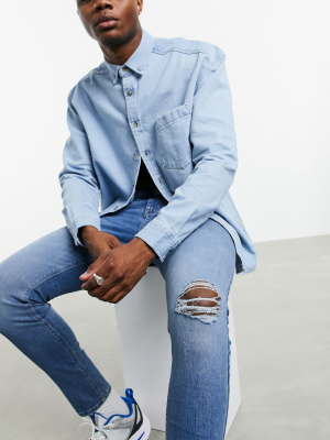 Asos Design 'responsible Edit' Spray On Jeans In Power Stretch In Light Wash Blue