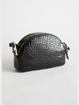 Half Moon Croc Embossed Crossbody Bag