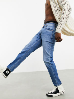 Asos Design 'responsible Edit' Tapered Jeans In Dark Wash Blue