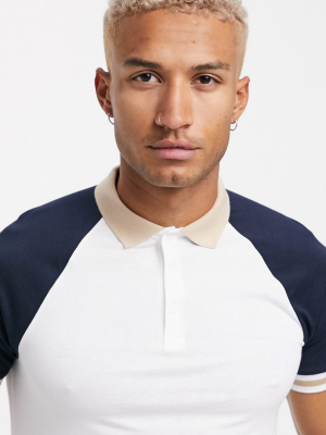 Asos Design Organic Raglan Polo Shirt With Contrast Sleeves And Tipping In Navy