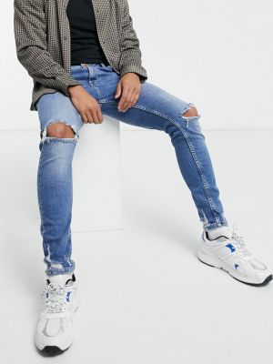 Bershka Super Skinny Jeans With Rips In Mid Blue