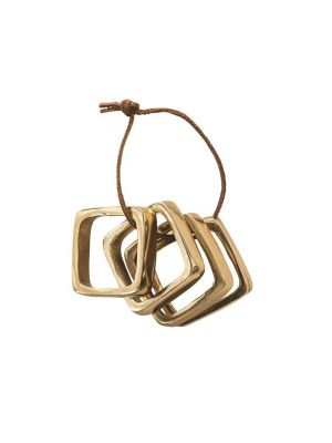 Square Metal Napkin Rings On Leather Tie In Brass Finish
