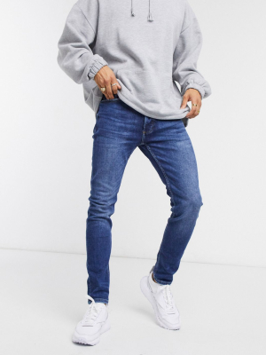 Topman Skinny Jeans In Mid Wash