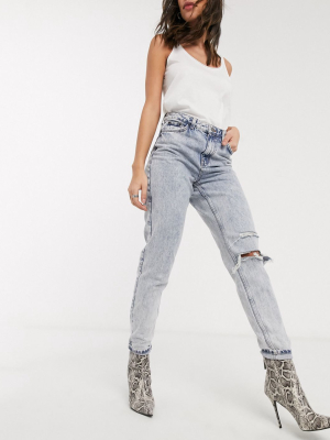 Topshop Mom Jeans With Ripped Knee In Bleach Wash