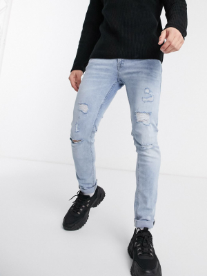 Jack & Jones Intelligence Liam Skinny Fit Super Stretch Abrasion Jeans In Light Wash