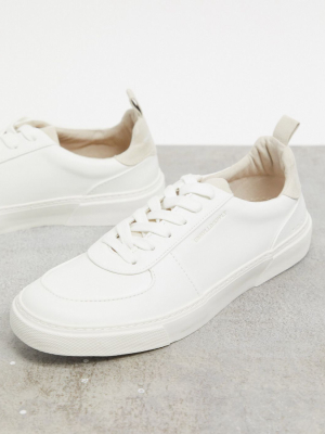 Asos Unrvlld Supply Sneakers In White With Stone Heel Tab