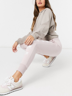 New Balance Stacked Logo Sweatpants In Pink