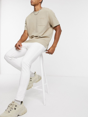 Asos Design Super Skinny Jeans In White With Raw Hem