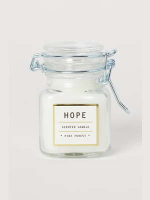 Small Candle In Glass Jar