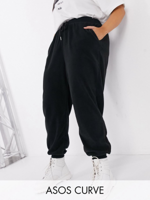 Asos Design Curve Basic Sweatpants With Tie In Fleece In Black