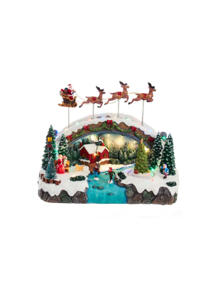 Kurt Adler 10.5" Battery-operated Led Musical Village With Santa And Reindeer Table Piece