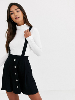 Asos Design Button Front Mini Pinafore Skirt In Black