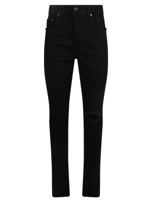 Amiri Broken Distressed Skinny Jeans