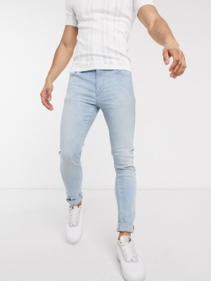 Asos Design Super Skinny Jeans In Light Wash Blue