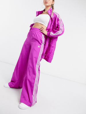 Adidas Originals Bellista Three Stripe Wide Leg Pants In Pink