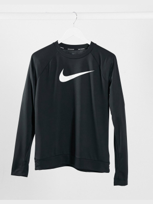 Nike Running Swoosh Logo Crew Neck Long Sleeve Top In Black