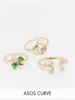 Asos Design Curve Pack Of 3 Dolphin And Clover Rings In Gold Tone