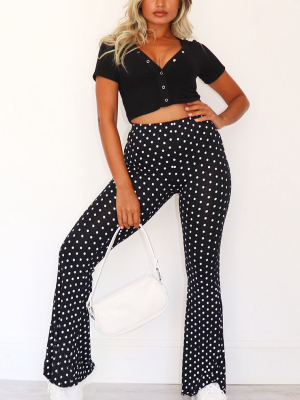 Petite Black Polka Print Flared Trousers