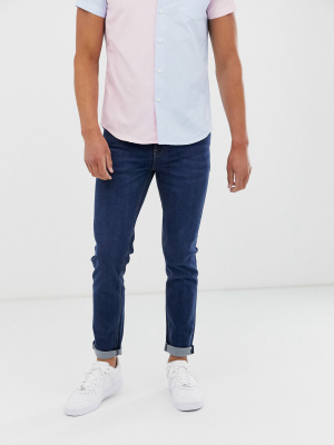 Asos Design Skinny Jeans In Flat Dark Blue