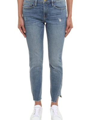 Frame Asymmetrical Hem Skinny Jeans