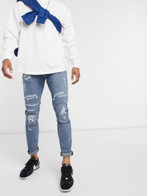 Tommy Hilfger Flag Patch & Repair Skinny Jean In Light Wash