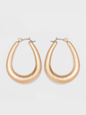 Tubular Teardrop Hoop Earrings - Universal Thread™ Worn Gold