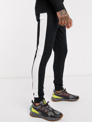 Asos Design Organic Skinny Sweatpants With Side Stripe In Black