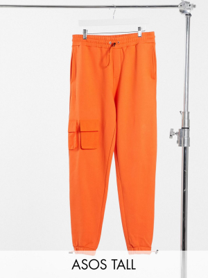 Asos Design Tall Co-ord Tapered Sweatpants In Orange Reverse Fleece With Nylon Pockets