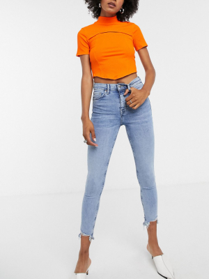 Topshop Jagged Hem Jamie Jeans In Bleach Wash