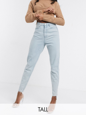 Missguided Tall Mom Jeans With Raw Hem In Light Wash Blue