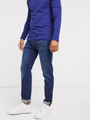 Levi's 501 Slim Tapered Fit Jeans In Boared Mid Wash