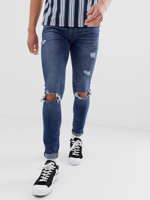 Jack & Jones Intelligence Spray On Skinny Jeans With Rip Detail In Mid Blue