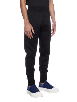 Alexander Mcqueen Graffiti Logo Patch Jogging Pants