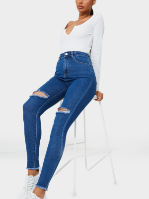 Prettylittlething Mid Blue Wash Open Knee Raw...