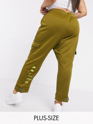 Nike Plus Swoosh Utility Pocket Sweatpants In Khaki Green