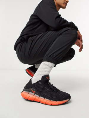 Reebok Zig Kinetica Sneakers In Black And Orange