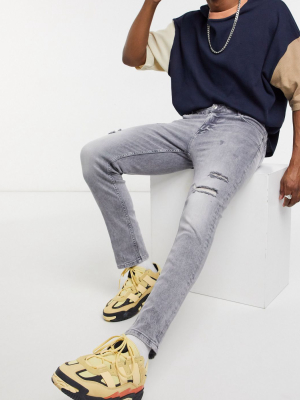 Asos Design Skinny Jeans In Light Gray With Knee Rips