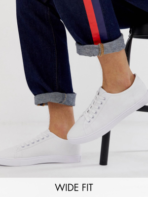 Asos Design Wide Fit Sneakers In White Canvas