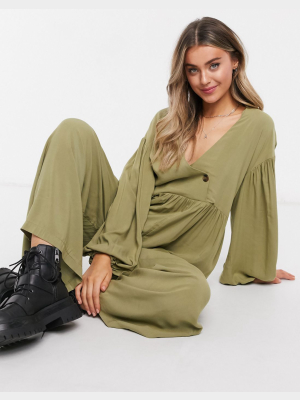 Asos Design Wrap Smock Jumpsuit With Button In Khaki