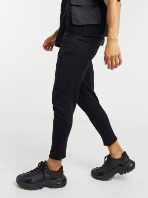 Asos Design Skinny Sweatpants With Raw Hem & Zip Pockets In Black