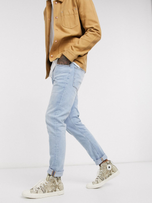 Asos Design Stretch Slim Jeans In Retro Light Wash Blue